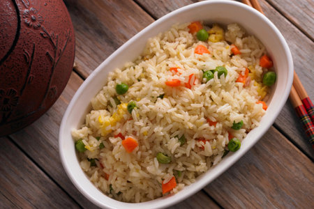 Chinese fried rice with vegetables in a bowl close-up. horizontalの写真素材