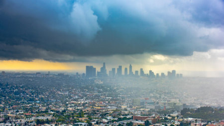 Los Angeles, California, USA downtown skyline at sunset with storm clouds.の写真素材