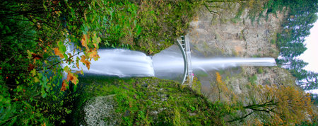 Waterfall in the forest. Panoramic view from above.の写真素材