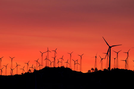 Wind turbines at sunset in the countryside of Portugal, Alentejoの写真素材