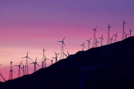 Wind turbines on top of a mountain at sunset, closeup of photoの写真素材