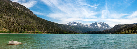 Panoramic view of a mountain lake in the Altai mountains