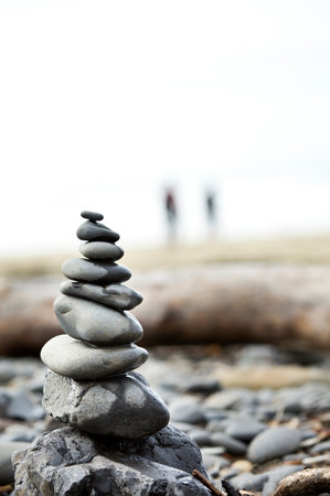 Pyramid of pebbles on the seashore. Zen conceptの写真素材