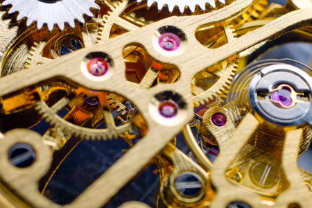 Macro detail of a clockwork mechanism with gears and cogwheelsの写真素材