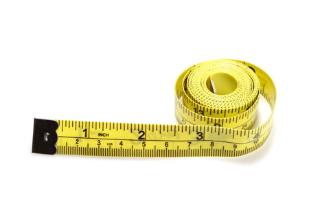 Yellow measuring tape isolated on white background.