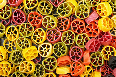 Colorful uncooked pasta background. Top view. Flat lay.