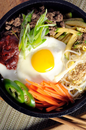 Bibimbap, japanese noodle with egg and vegetablesの写真素材