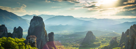 Panoramic view of Meteora mountains in Greece at sunriseの写真素材