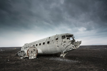 Wreck of an old military aircraft in the desert of Iceland.の写真素材