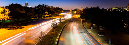 Traffic on the freeway at night in downtown Los Angeles, California.