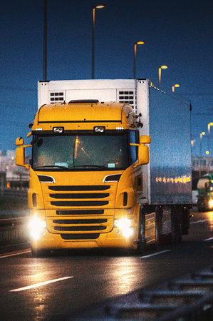 Truck on the road at night. Conceptual image of transport.