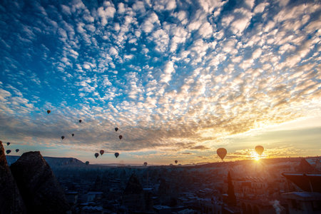 Hot air balloons flying over Cappadocia, Turkey.の写真素材