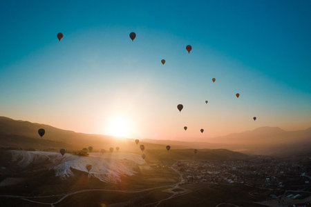 Hot air balloons flying over Cappadocia, Turkey.の写真素材