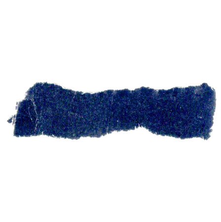 Piece of torn blue jeans fabric isolated on white background. Rough uneven edges.の写真素材