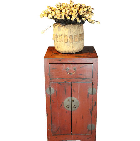 Vase with dried flowers on the old wooden chestの写真素材