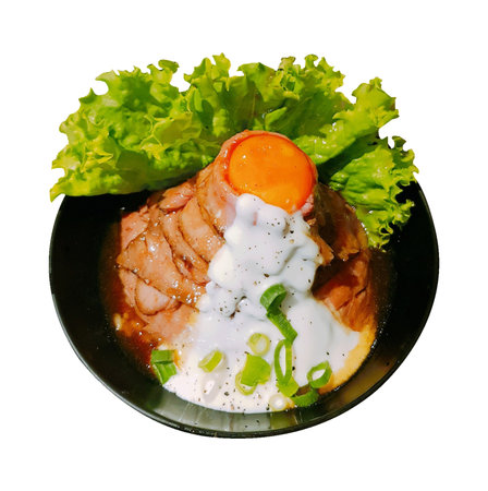 Pork sashimi on black plate isolated on white background.の写真素材