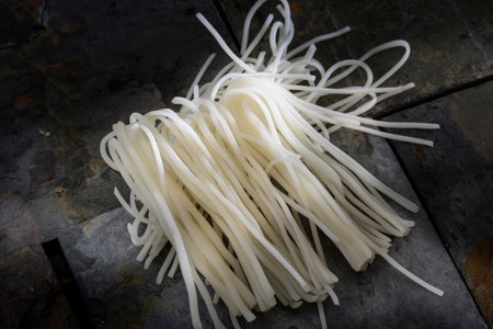 close up of asian noodle on black background, chinese food