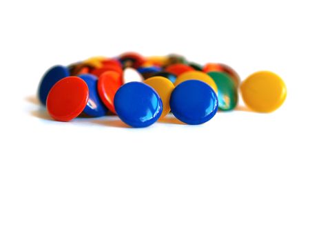 colored drawing-pins on the white backgroundの写真素材
