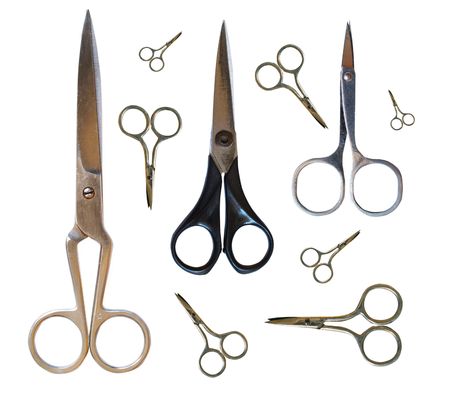 big and small scissors on white background