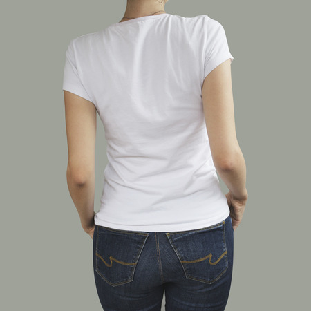 Young beautiful sexy female with blank white shirt, back. Ready for your design or artwork.の写真素材