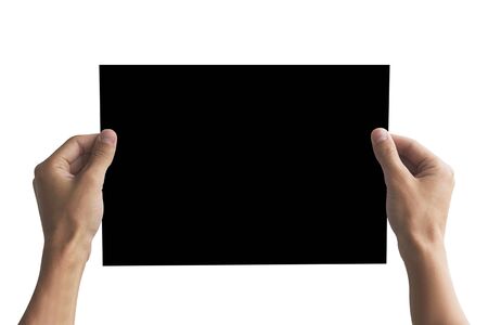 Hands holding black A4 paper in the hand. Leaflet presentation. Pamphlet hand man. Man show offset paper. Sheet template. Book in hands. Booklet folding design. Fold paper sheet display read.の写真素材