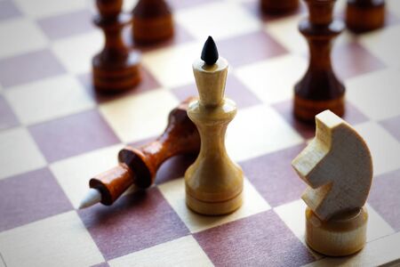Wooden chess set on chess Board. Chess. Black and white. Closeup.の写真素材