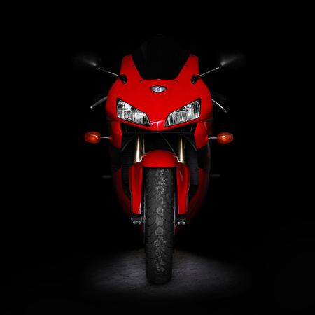 KRASNOYARSK, RUSSIA - OCTOBER 15, 2017: Red sports bike in the dark. Two lights. Front view....