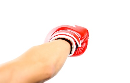 Strike hand in glove. Red Boxing gloves. Two gloves sports. Isolated on a white background.の写真素材