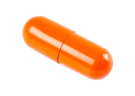 Orange capsule. Macro. Closeup.の写真素材