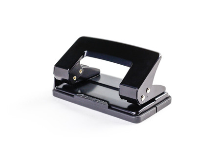 Black hole punch for paper on white background. Closeup.の写真素材