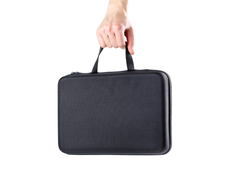 Hands holding a black case. Isolated on white background.の写真素材