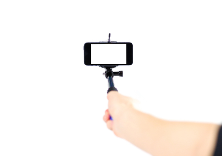 Selfie stick for phone. Close up. Isolated on white background.の写真素材