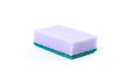 Dish washing sponge. Close up. Isolated on white background.の写真素材