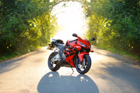 KRASNOYARSK, RUSSIA - September 7, 2018: Red and black sportbike Honda CBR 600 RR 2005 PC37 on sunsetのeditorial素材
