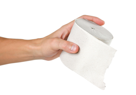 Hand holding toilet paper on white background. Close up.の写真素材