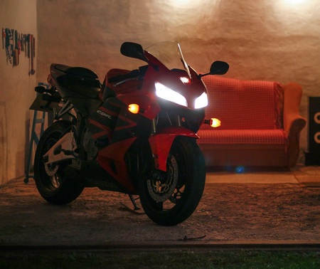 KRASNOYARSK, RUSSIA - August 16, 2018: Red and black sportbike Honda CBR 600 RR 2005 PC37 in garage