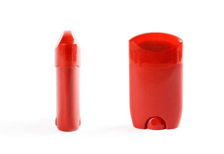 Red antiperspirant. Close up. Isolated on white background.