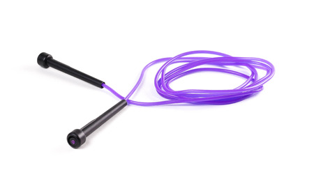 Purple jump rope. Close up. Isolated on white background.の写真素材