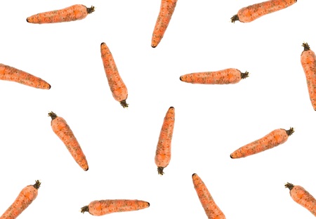 Pattern of carrots. Close up. Top view. Isolated on white background.の写真素材