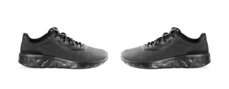 Black sports women's running shoes. Close up. Isolated on white background.の写真素材