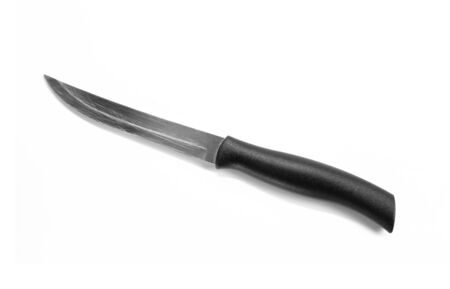 Metal knife with black handle. Close up. Isolated on white background.の写真素材