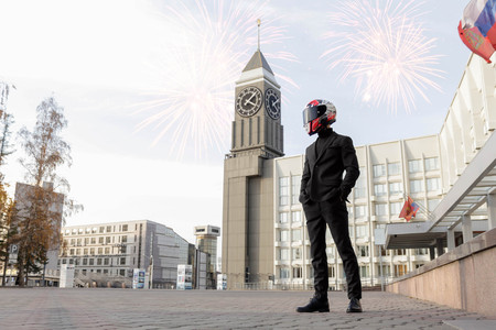 KRASNOYARSK, RUSSIA - October 13, 2019: Beautiful motorcyclist in black suit and helmet.のeditorial素材
