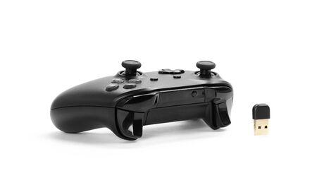 Black gamepad for playing computer games. Gamepad and receiver for PC.