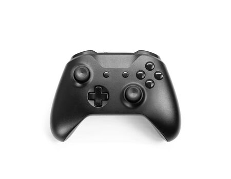 Black gamepad for playing computer games. Isolated on a white background. Close up.