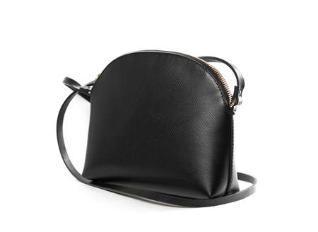 Small women handbag in black. Close up. Isolated on a white background.の写真素材
