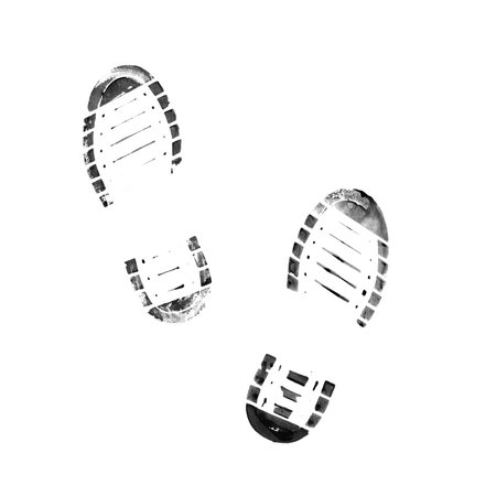 Muddy bootprints. Isolated on white background. Close up.の写真素材