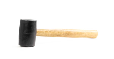 Rubber mallet with wooden handle. Close up. Isolated on a white background.の写真素材