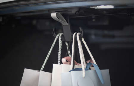 A hook for packages in the trunk of the car. Close up.の写真素材