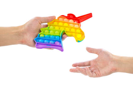 Passes a Pop it in the shape of a unicorn. Close up. Isolated on a white background.の写真素材