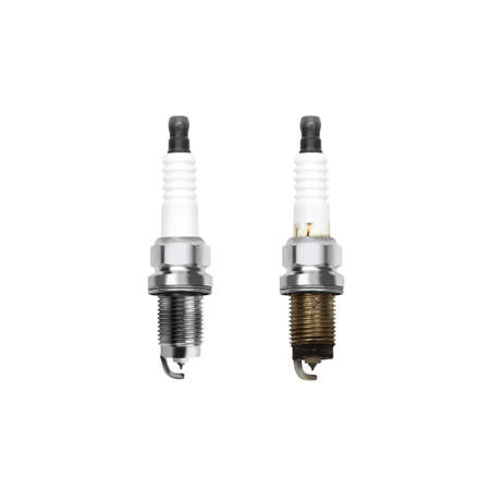 New and used iridium spark plugs. close up. isolated on a white background.